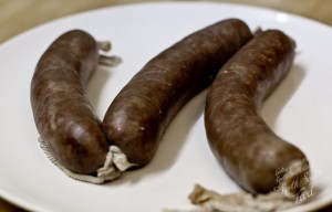 Three poached home-made black puddings